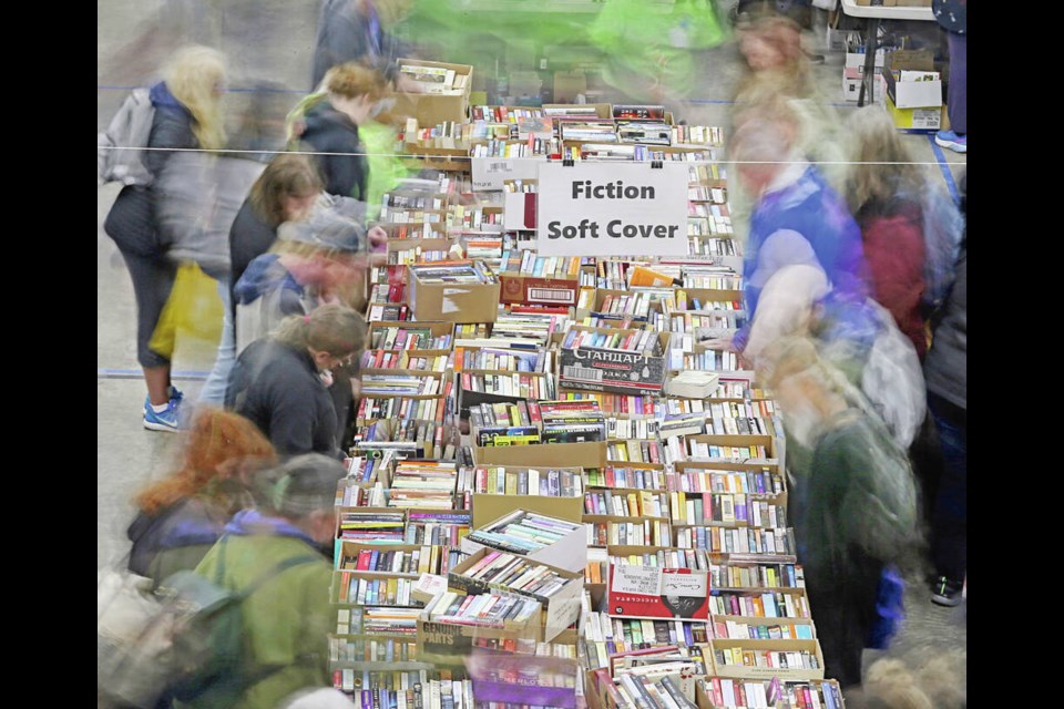 Shoppers at the Times Colonist Book Sale on Saturday at the Victoria Curling Club. ADRIAN LAM, TIMES COLONIST 