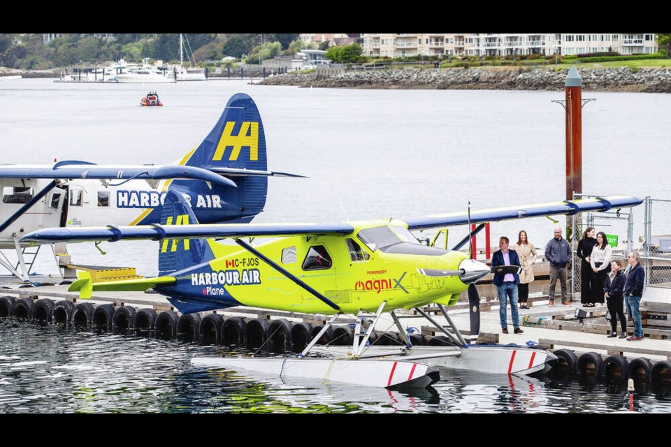 Harbour Airs e-plane, seen at the companys Victoria Harbour terminal on Monday, could be offering passenger service between the Island and the mainland in two years. Story, B1 DARREN STONE, TIMES COLONIST 