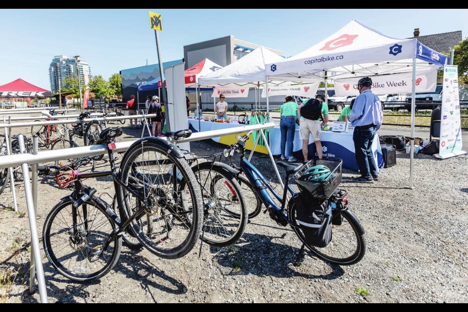 A celebration station at Esquimalt Road and Mary Street as part of Go By Bike Week. DARREN STONE, TIMES COLONIST 