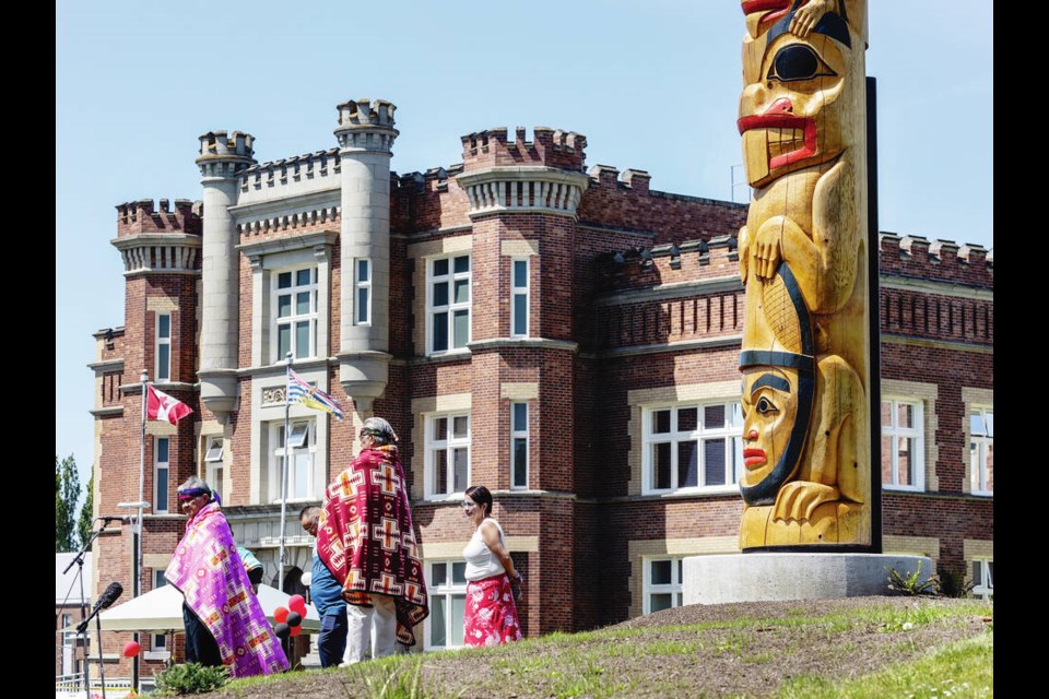 A dedication ceremony for the pole carved by men at Vancouver Island Regional Correctional Centre.  