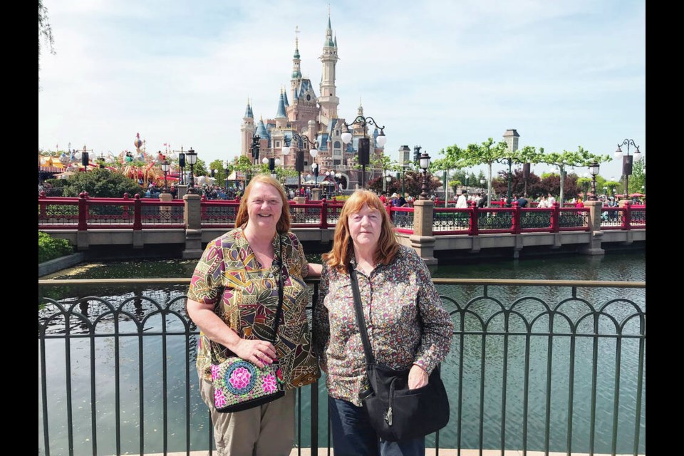 Kim Pemberton, left, with her sister Denise on a previous visit to Shanghai Disney. KIM PEMBERTON 