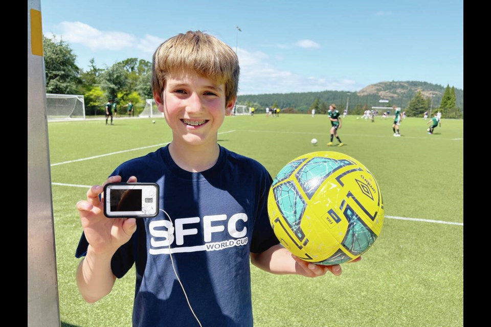Andrei Marti, 13, a student at St. Michaels University School, holds a glucose monitoring device and a football after a recent soccer practice. The Brentwood Bay teen took home the Platinum Award at the 2023 Canada-Wide Science Fair awards for his Sweet Scores STEM project. TIMES COLONIST 