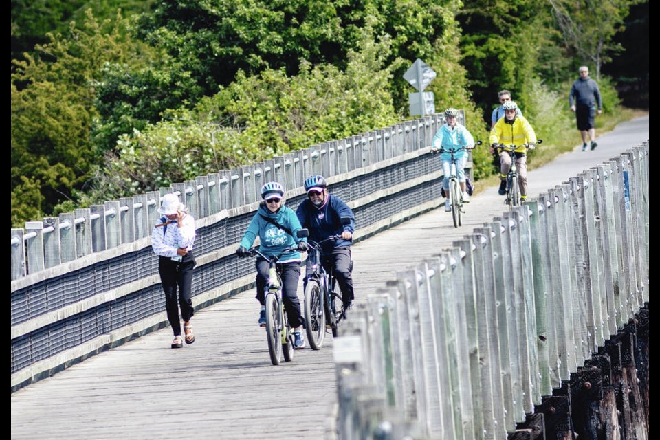 Cyclists and pedestrians share the Galloping Goose Regional Trail on the Selkirk Trestle. DARREN STONE, TIMES COLONIST 