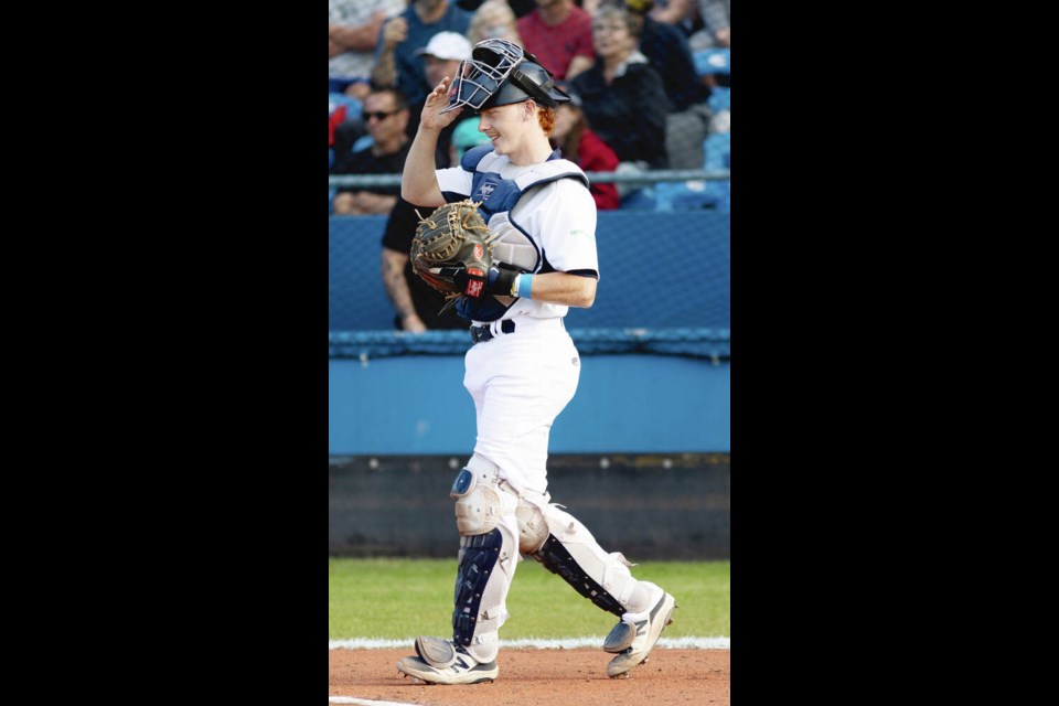 HarbourCats catcher Russell Young helped his team to an opening night victory over the NorthPaws on Friday at Wilsons Group Stadium at Royal Athletic Park. DARREN STONE, TIMES COLONIST 