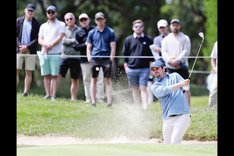 Étienne Papineau hits out of a bunker during the third round of the Royal Beach Victoria Open at Uplands Golf Club on Saturday.  ADRIAN LAM, TIMES COLONIST 