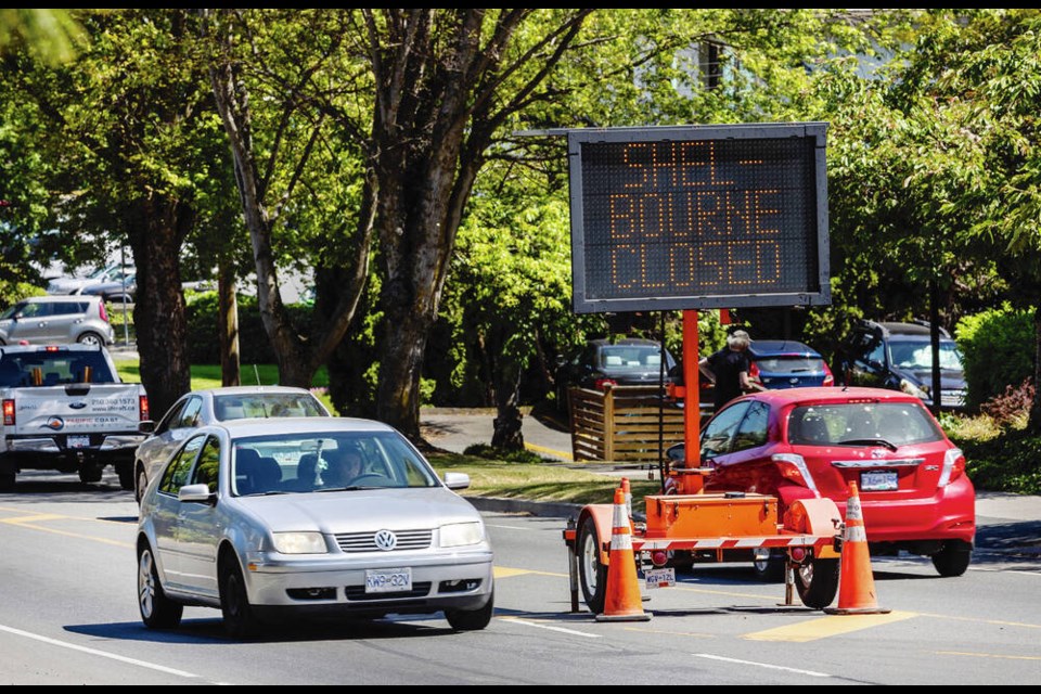 Shelbourne Closed sign on the eastbound Cedar Hill Cross Road approach to Shelbourne Street on Friday. DARREN STONE, TIMES COLONIST 