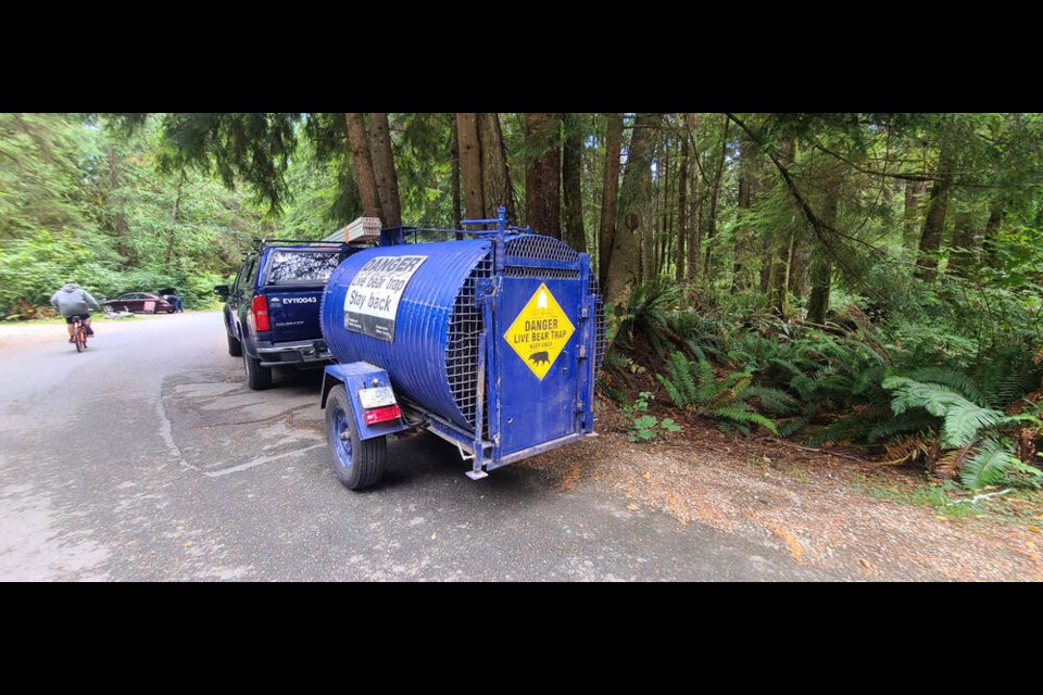 The Conservation Officers Service brings a bear trap into French Beach Provincial Park on Wednesday, July 26, 2023.. ANGELA FLETCHER 