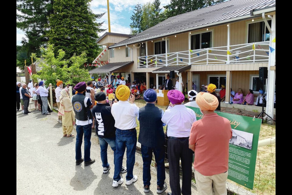 Above: Sikh community members in the Cowichan Valley gather for the opening of the Paldi Historical Museum. 
VIA OFFICE OF MP ALISTAIR MacGREGOR 