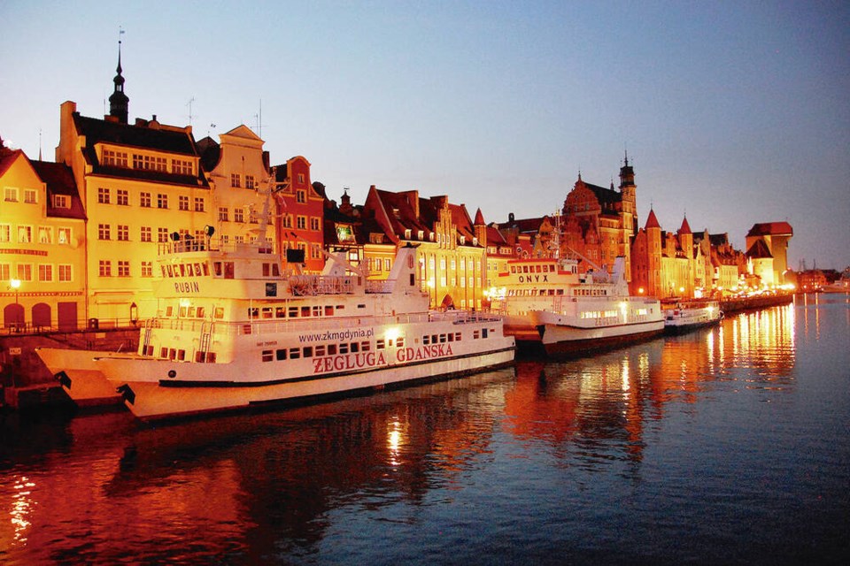 Excursion boats tie up along Gdańsk’s old-town riverfront, where merchant ships once came to trade. CAMERON HEWITT  