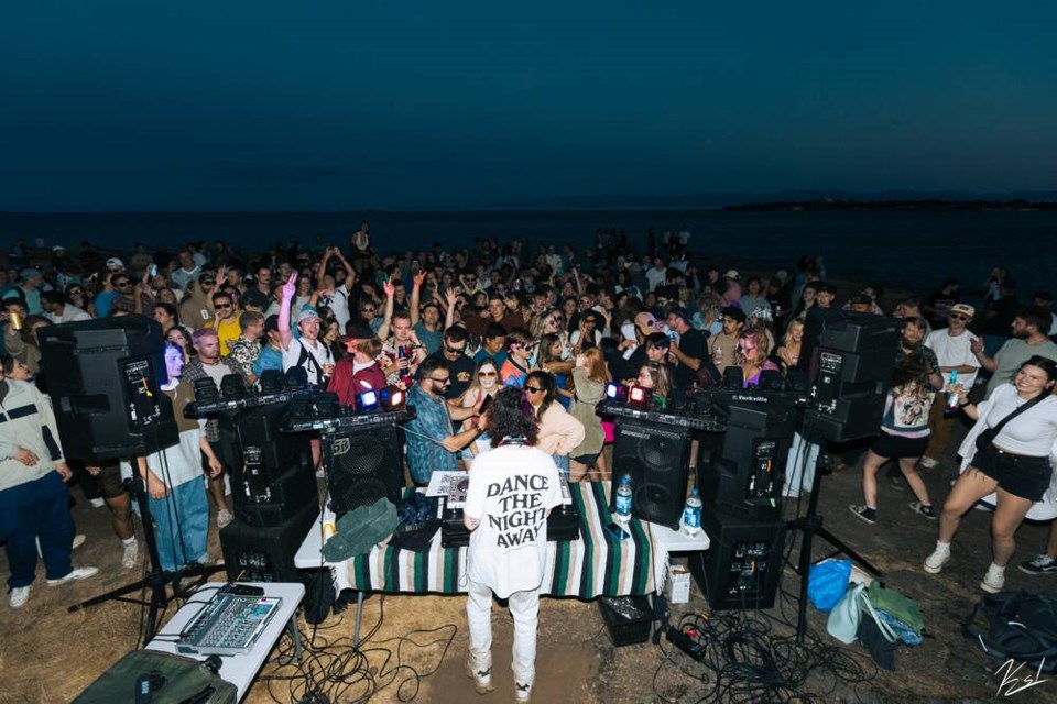 Vancouver-based electronic music producer Felix Cartal playing a pop-up sunset show at Cattle Point on Friday. The show location was only disclosed three hours prior to its start. VIA KYLE S. LEE MEDIA 