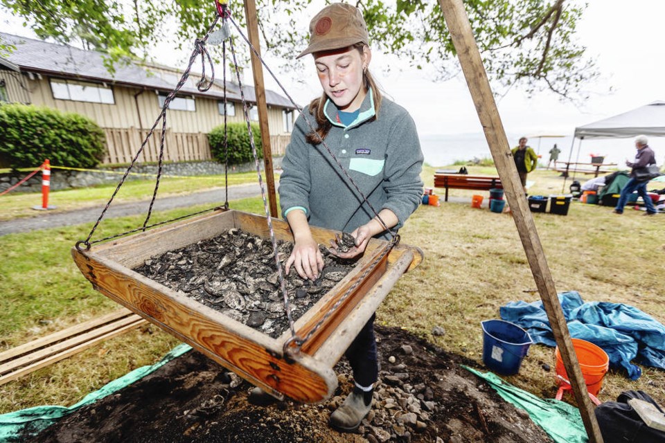UVic anthropology student Skye Bartel-Ens works at an archeological dig in Cordova Bay’s Agate Park, an ancient First Nations village site. DARREN STONE,TIMES COLONIST 