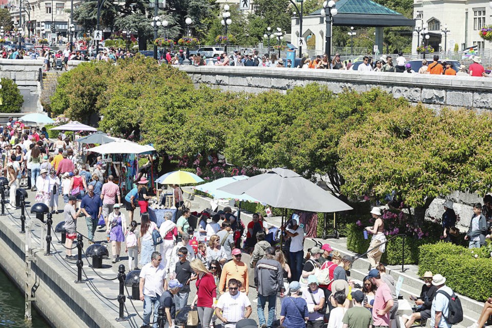 Crowds flock to the Inner Harbour, which is often abuzz with musical and other performances by buskers. ADRIAN LAM, TIMES COLONIST 