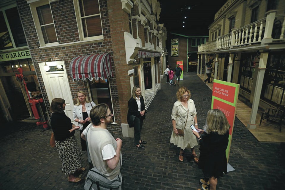 People gather for the reopening of Old Town, featuring a reworked ­exhibition space and new information panels, at the Royal B.C. Museum on Saturday. ADRIAN LAM, TIMES COLONIST