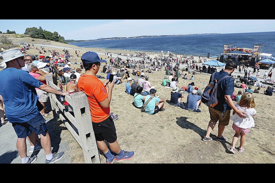Thousands of people turned out at Colwood’s Royal Beach on Saturday for Eats and Beats, which featured music played by local bands, a food-truck festival, a beachside beer garden, street market and a climbing wall. ADRIAN LAM, TIMES COLONIST 