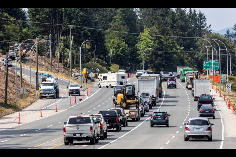 Keating Cross Road Overpass Project construction site, at left, on Tuesday. DARREN STONE, TIMES COLONIST 