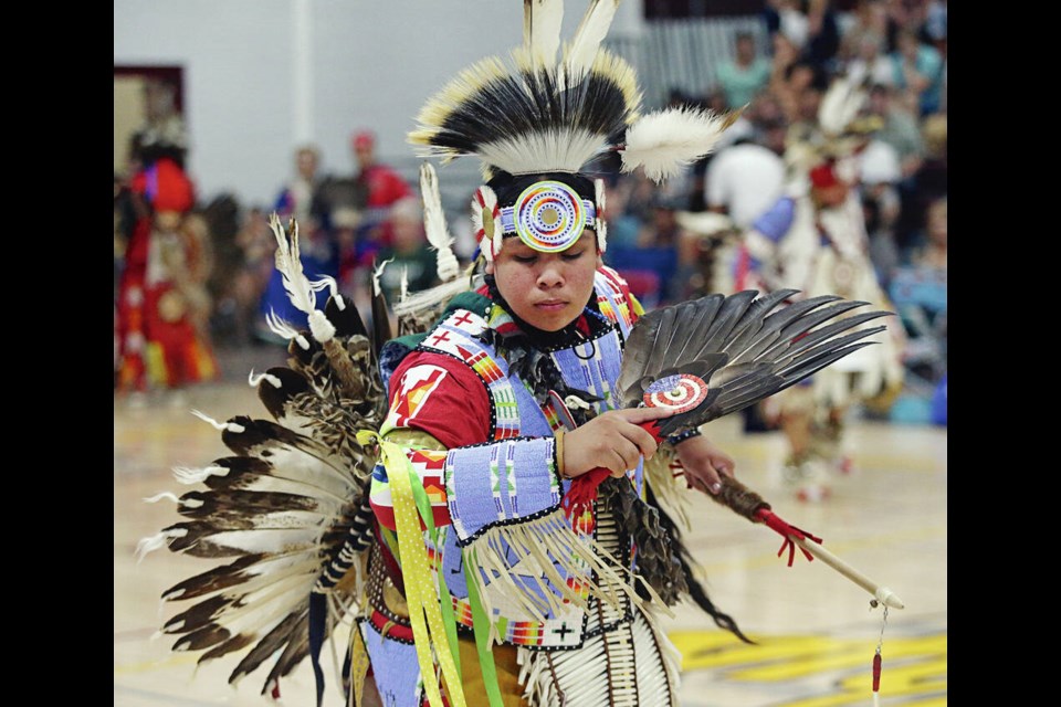 Leevi Running Bear performs a dance for the Yellow Wolf Inter-tribal Powwow at Stelly’s Secondary School on Saturday. The event continues today. PHOTOS BY ADRIAN LAM, TIMES COLONIST  