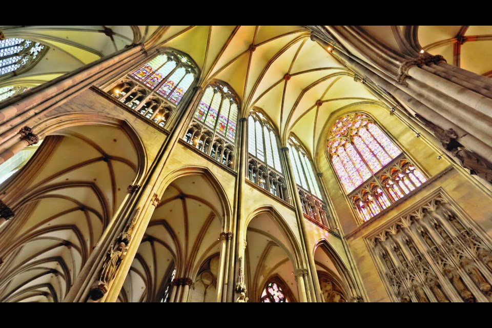 The nave of Cologne’s Gothic cathedral towers 140 feet above its visitors. DOMINIC ARIZONA BONUCCELLI 