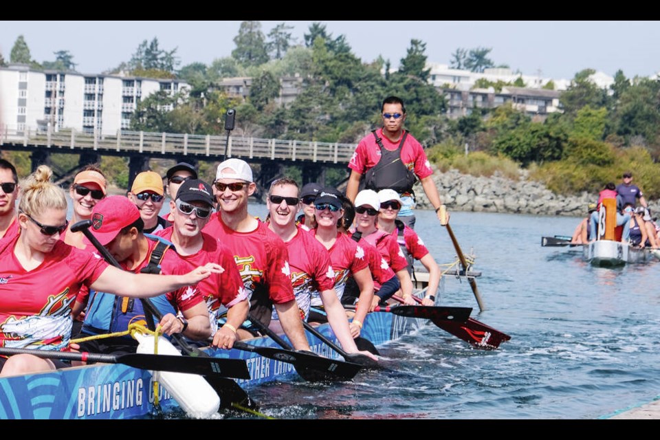 Members of Calgary’s Crew Yahoo gliding towards the paddling dock after a victorious 200-metre sprint at the Vancouver Island Dragon Boat Festival. TIMES COLONIST Aug. 26, 2023 