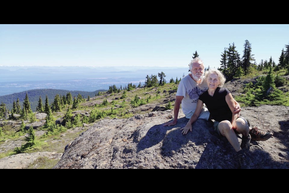 Thierry Vrain and his wife, Chanchal Cabrera, on the peak of Mount Becher on Aug. 14. On the descent, he took a side trail to avoid a rocky section and ended up getting lost and injured. VIA THIERRY VRAIN 