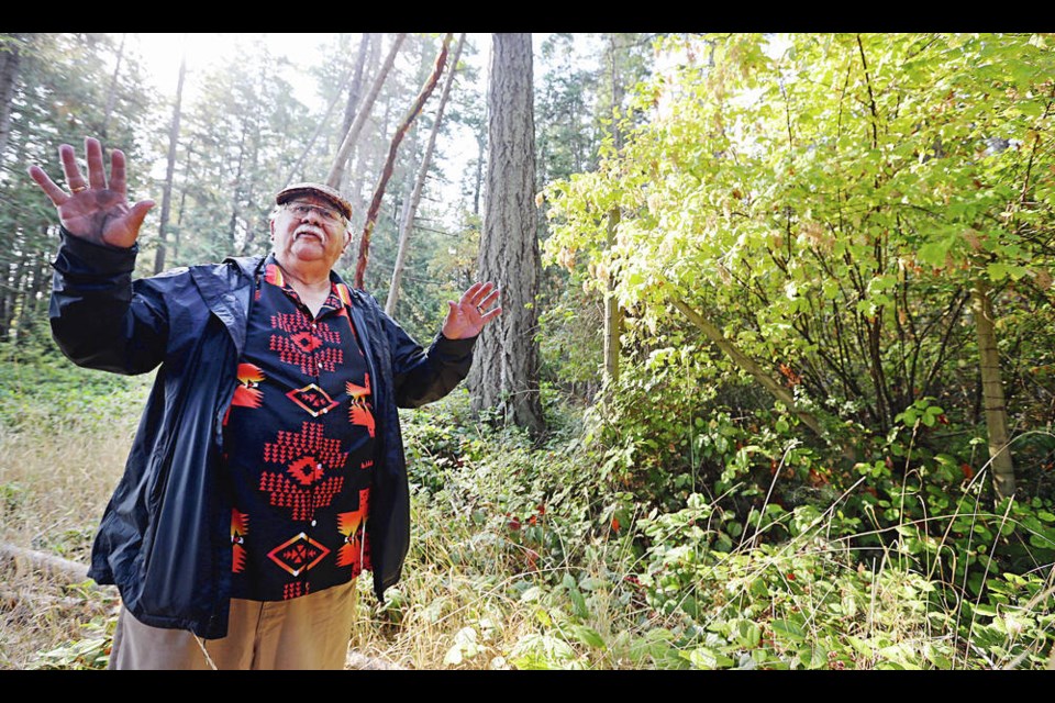 Eric Pelkey from Tsawout Nation talks to the media in front of a fenced-off area on Sidney Island, as National Parks staff and First Nations offer a tour of Sidney Island to show evidence of damage caused by fallow deer. ADRIAN LAM, TIMES COLONIST 