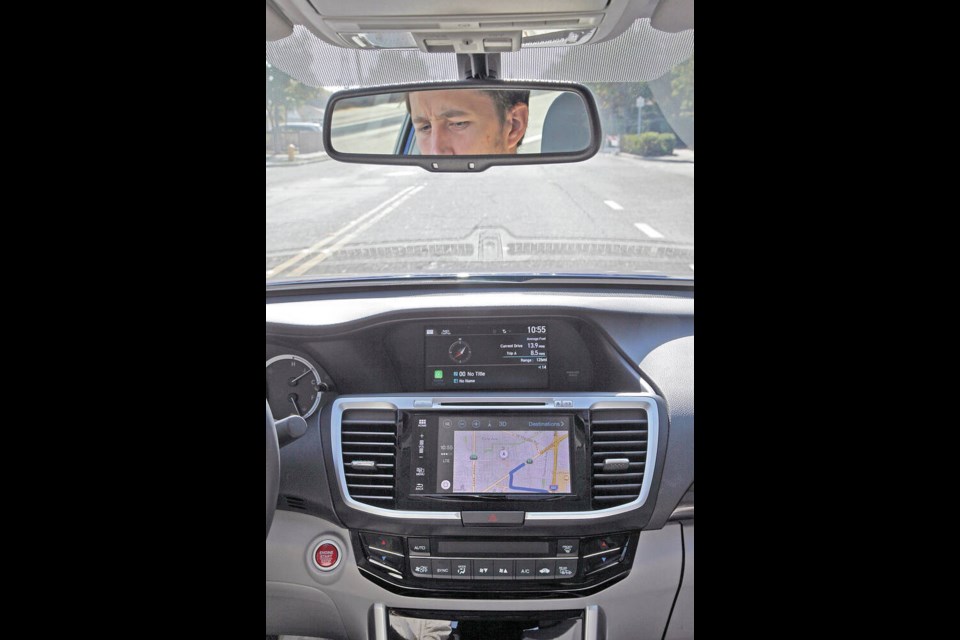 A map appears on the dashboard screen of a Honda Accord that is hooked up to an iPhone. GPS enabled maps are great but you should keep a good old-fashioned paper map in the glove box just in case, writes John Ducker. TRIBUNE NEWS SERVICE 