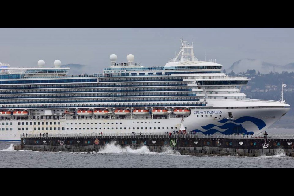 A tugboat had to be brought in to help the Crown Princess cruise ship trying to dock at Ogden Point during high winds Monday morning, Sept. 25. DARREN STONE, TIMES COLONIST