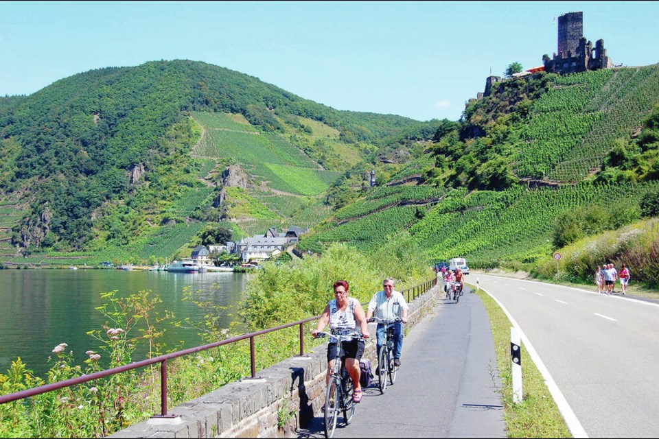 Biking along the sleepy and windy riverside bike path near Beilstein makes for an enjoyable day. RICK STEVES 