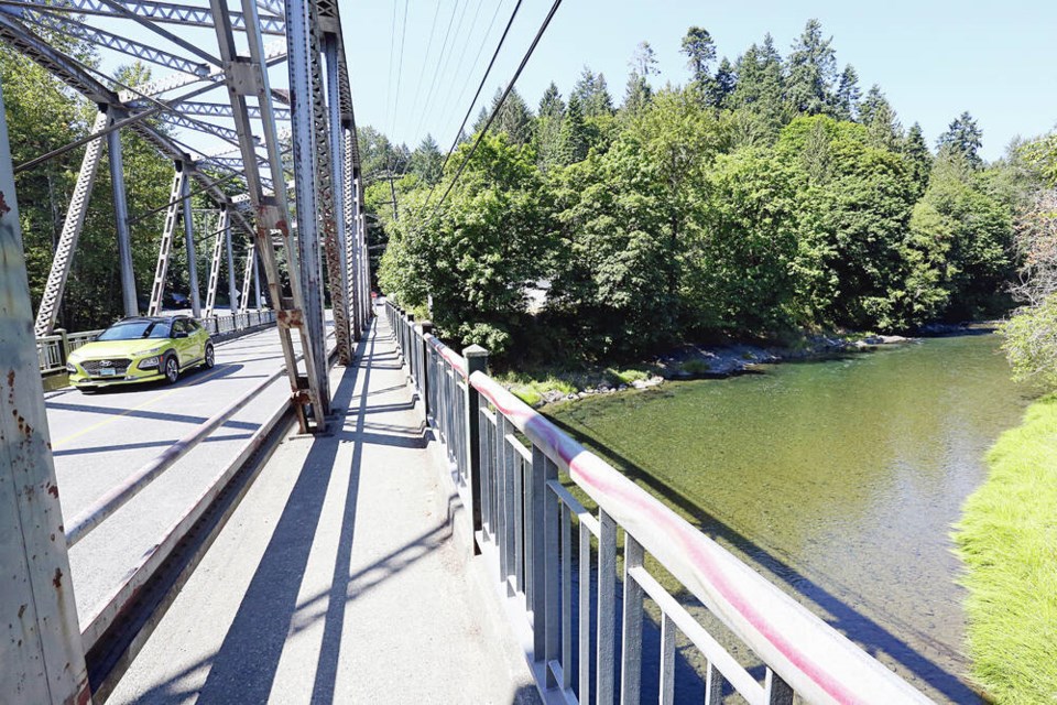 The Cowichan River flows under a bridge on Allenby Road in Duncan. ADRIAN LAM, TIMES COLONIST 