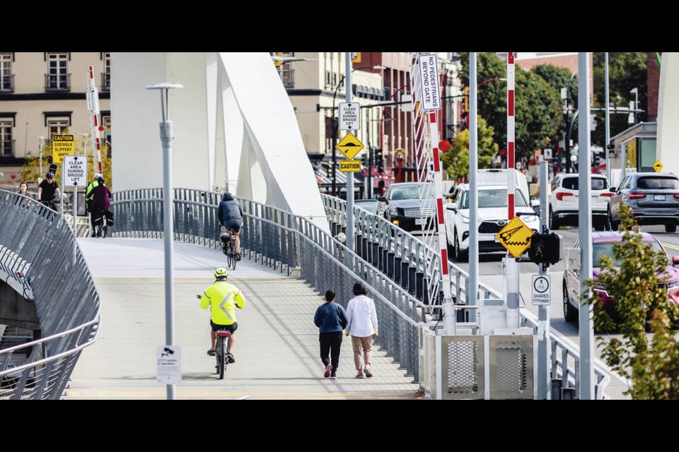 Cyclists, pedestrians and cars cross the Johnson Street Bridge in Victoria this week. DARREN STONE, TIMES COLONIST 