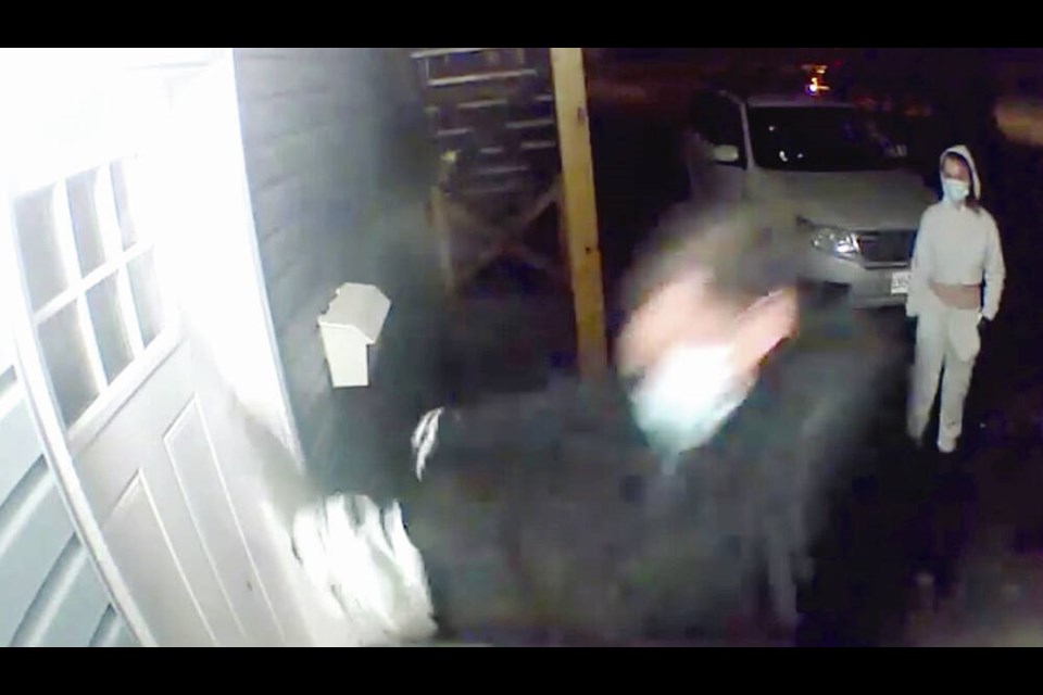 A still shot from surveillance video image of the attempted home invasion. VIA FACEBOOK 