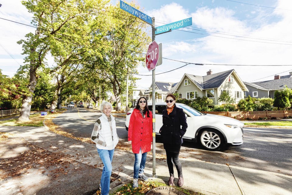 Hollywood Crescent residents Suzanne Longpre, left, Sanem Le Gresley and Valerie Sovran want to close the street for Halloween. DARREN STONE, TIMES COLONIST 