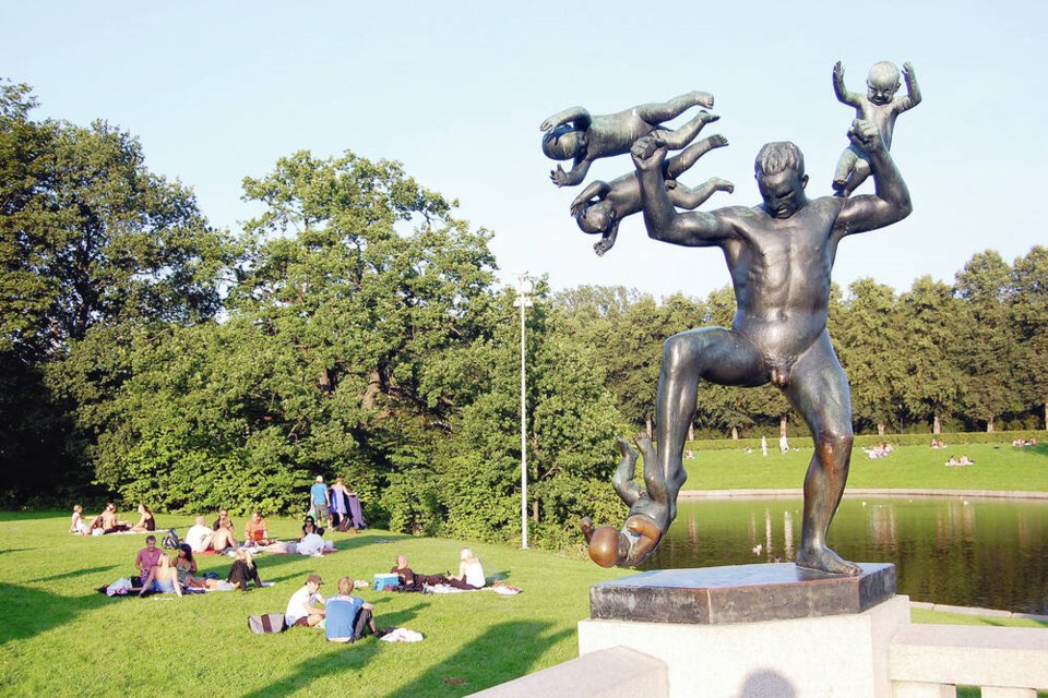 Statues delight the many Oslovians who love relaxing in Frogner Park on a sunny day. RICK STEVES 