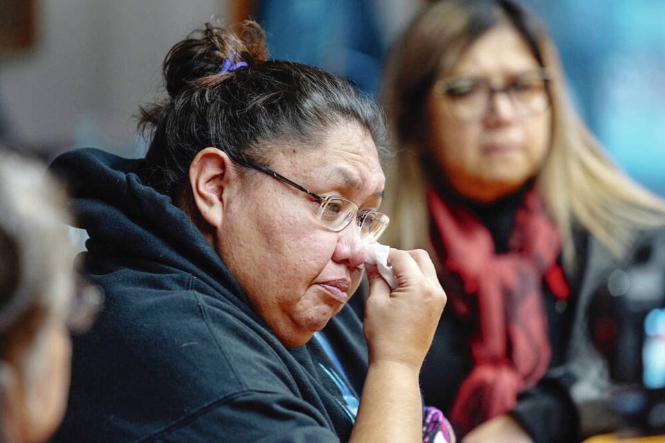 Jessica George cries as she tells her story on Thursday in the Cowichan Tribes council chambers in Duncan. DARREN STONE, TIMES COLONIST 