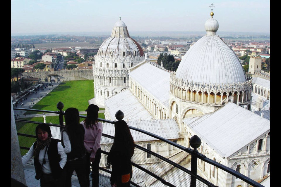 Duomo, Baptistery, and Field of Miracles as seen from Leaning Tower of Pisa. Climb the Leaning Tower’s 294 steps for a breathtaking view of Pisa’s cathedral and beyond. RICK STEVES 