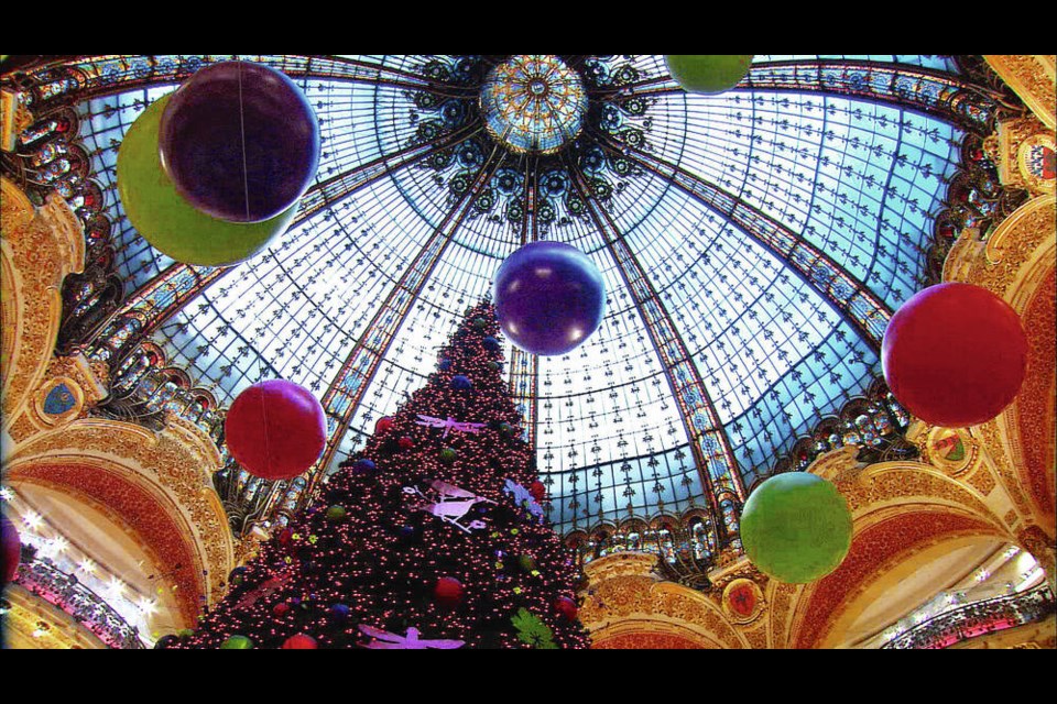 The spectacular stained-glass dome at the Galeries Lafayette department store is particularly festive during the holiday season. RICK STEVES 