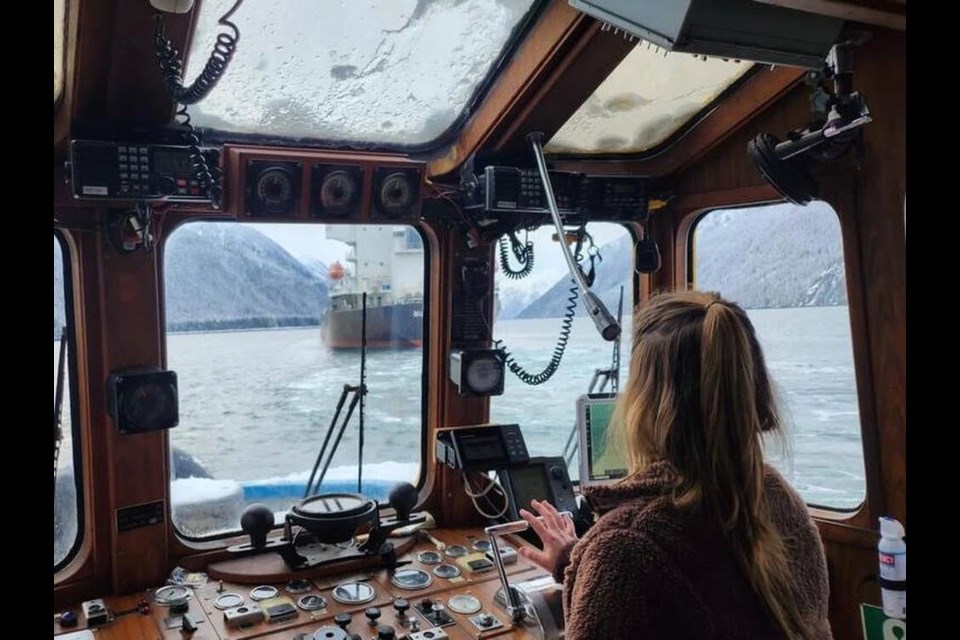 Hailey McIntyre, captain of what is believed to be the first all-woman tugboat crew in B.C., on a trip from Prince Rupert to Stewart for SAAM Towage in December 2023. OCEAN RUTHERFORD