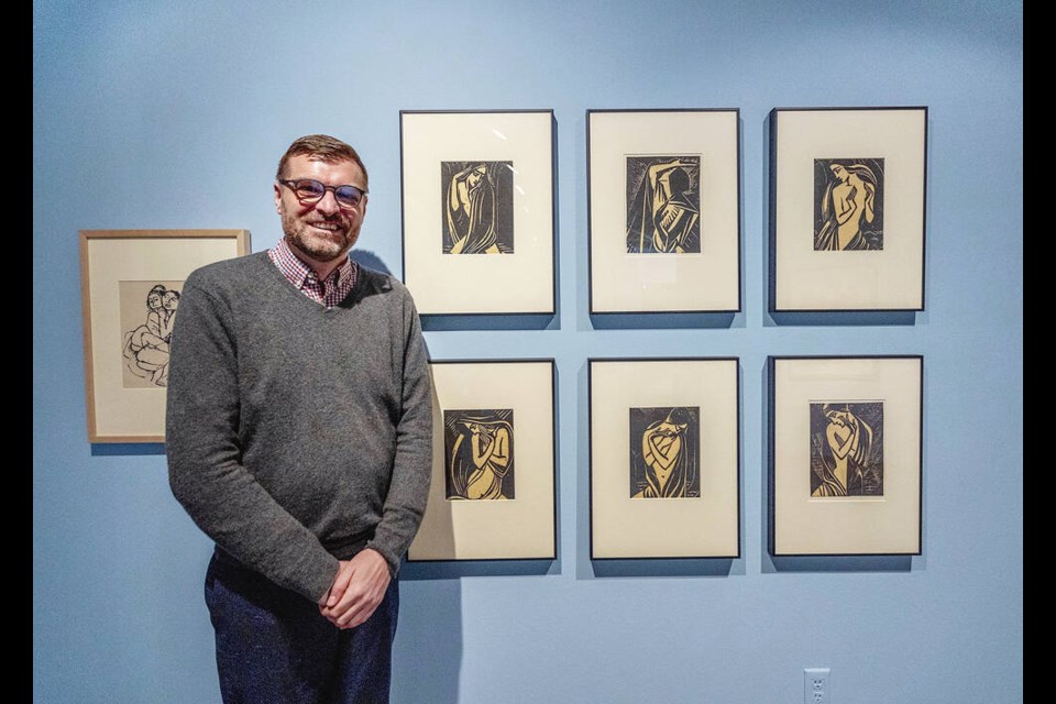 Curator Steven McNeil with a series of prints called The Emotions by Emma Schlangenhausen (1882-1947). The series is on display as part of the exhibit In The Flesh: The Nude in Art, Past and Present, opening Saturday at The Art Gallery of Greater Victoria. DARREN STONE, TIMES COLONIST 