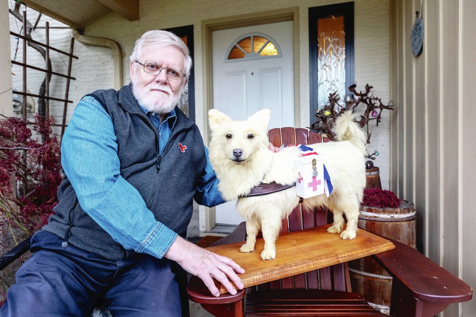 Paul Jenkins with the taxidermy version of Muggins the fundraising dog  freshly restored after being forgotten in a Colwood attic for decades. DARREN STONE, TIMES COLONIST 