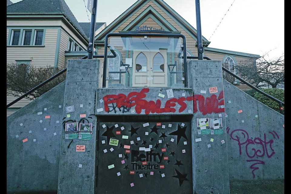 Graffiti and stickers mark the front of the Belfry Theatre in late December 2023. ADRIAN LAM, TIMES COLONIST 