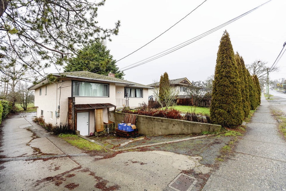 A home at 4126 Glanford Ave. in Saanich is one of three that could be demolished to make way for a townhouse development. DARREN STONE, TIMES COLONIST 