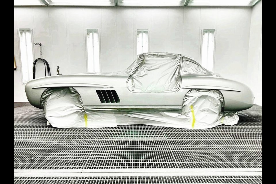 A Mercedes-Benz 300SL gullwing coupe in the paint booth. VIA COACHWERKS 