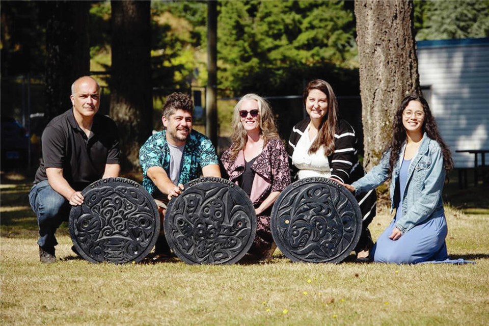 The utility cover project team, from left, Keith Reymerink, Joel Good, Aunalee Good, Annalisa Fipke and Teresa Dohm. SEAN FENZL 