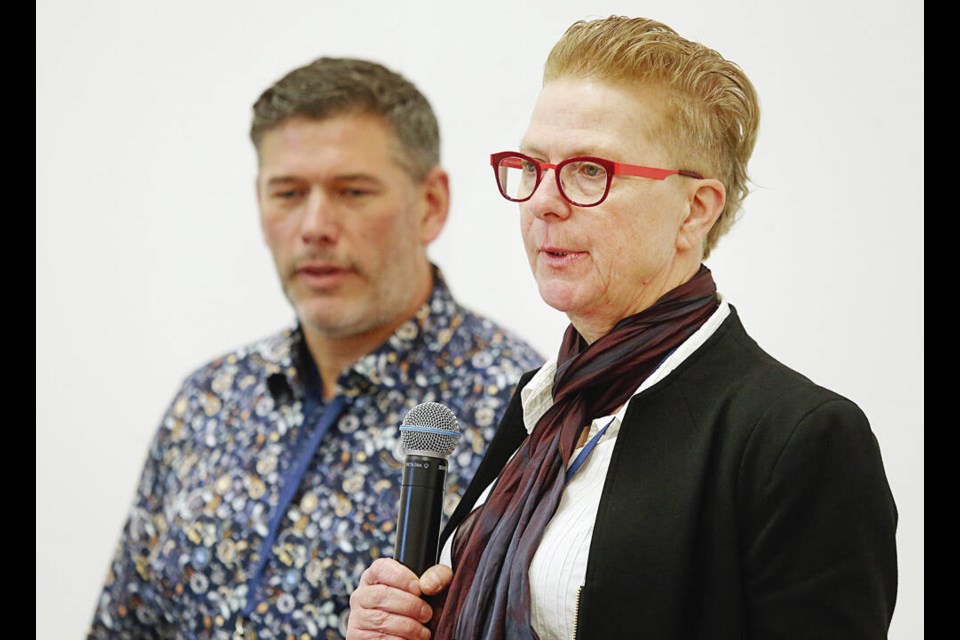 Josh Handysides, left, from Malahat Nation, and Beverley Dondale, owner of Alpha Select, speak about the plan for a new film studio on Malahat Nation land near Mill Bay. ADRIAN LAM, TIMES COLONIST 