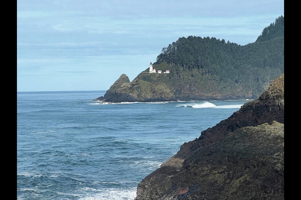 A view of the Heceta Head Lighthouse, one of 11 lighthouses on the Oregon Coast, from the Sea Lion Caves, a popular tourist attraction since 1932. KIM PEMBERTON 