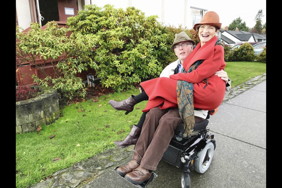 Peter Foran prefers taking Victoria bike lanes over the sidewalk in his motorized wheelchair, and sometimes lets his wife, Janice, sit in his lap when she gets tired. VIA PETER FORAN 