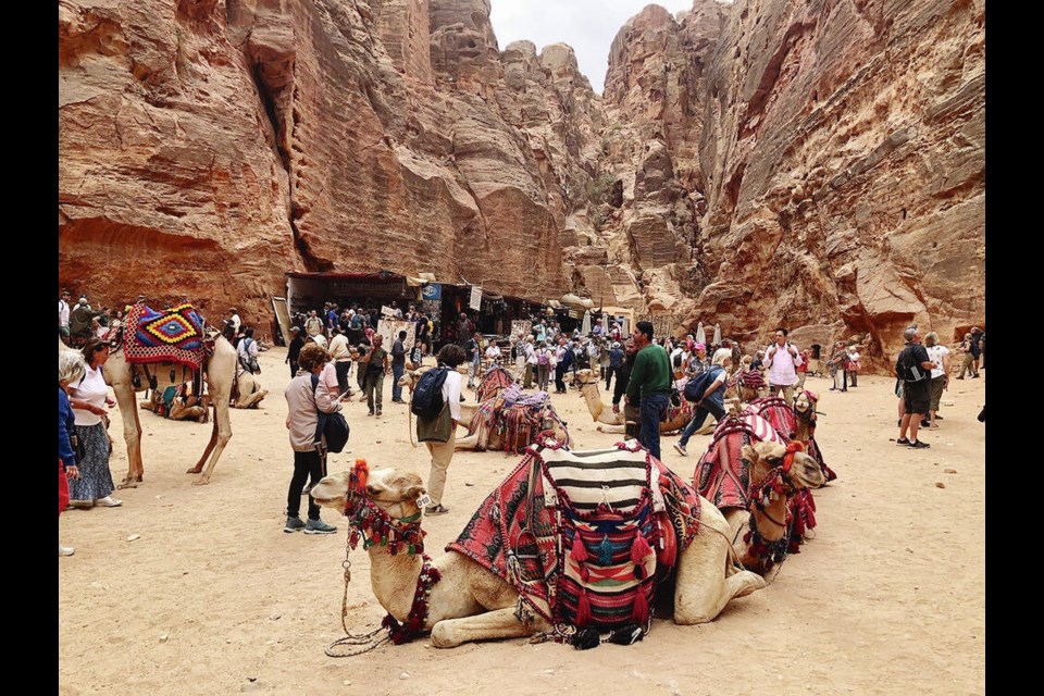In Petra, trails climb up to a series of Royal Tombs, including the Silk Tomb, which has a facade and soaring interior ceiling resembling an abstract painting. To get around, visitors can hire camels or horses. PATTI PITTS