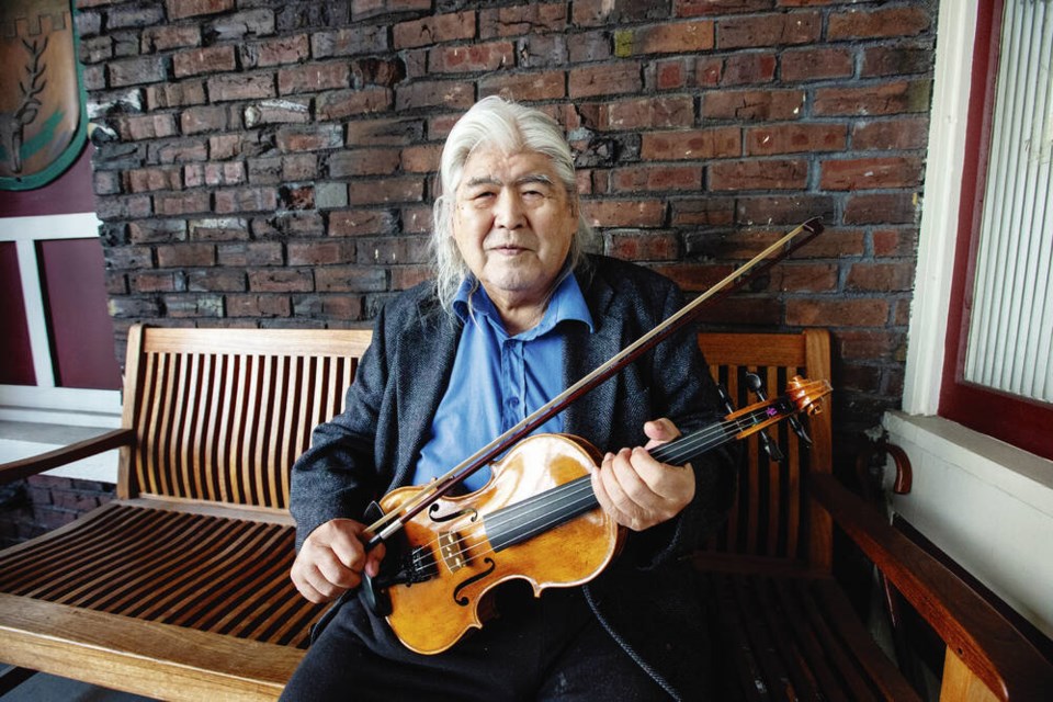 Wally Firth at Glensheil Housing with the bow paramedics gifted him in 2020. DARREN STONE, TIMES COLONIST 