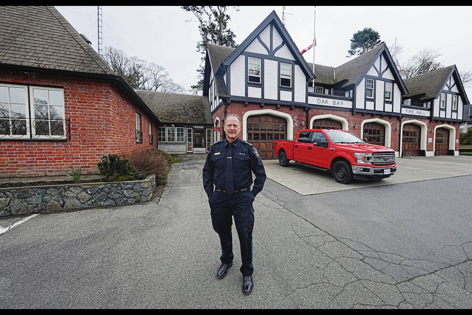 Oak Bay Police Chief Mark Fisher in front of the Oak Bay police station on Monterrey Ave. ADRIAN LAM, TIMES COLONIST 