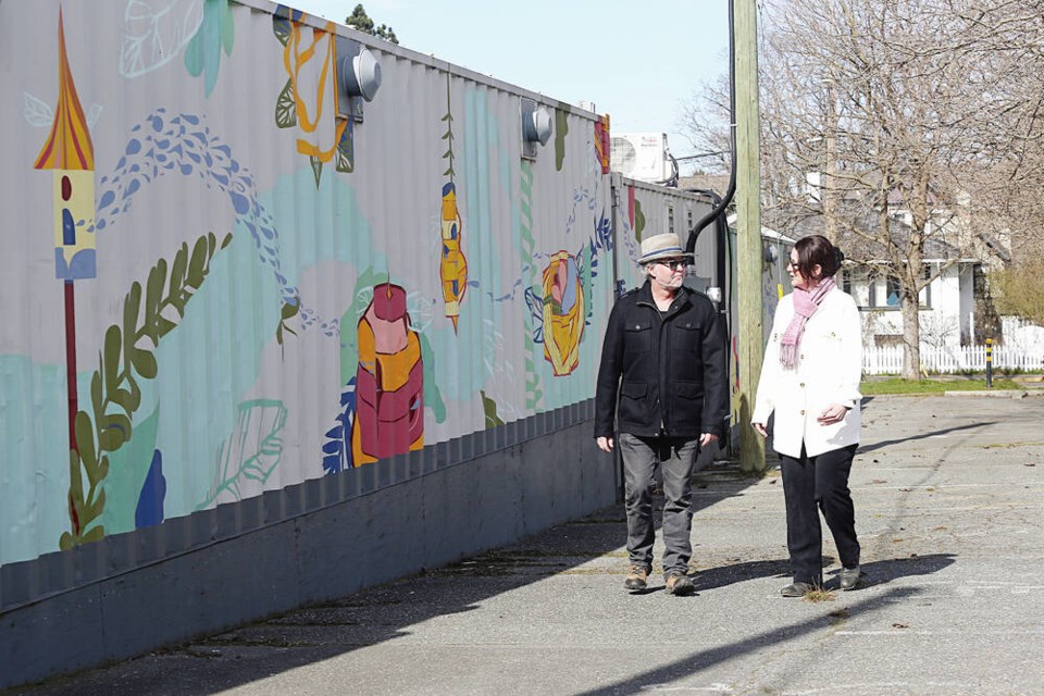 Coun. Krista Loughton and North Park resident Sean Kahil outside Caledonia Place, formerly known as Tiny Town. ADRIAN LAM, TIMES COLONIST 