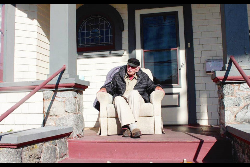 Trevor Anderson in his deck chair wearing his distinctive hat on his 100th birthday three years ago. 
VIA FAMILY 